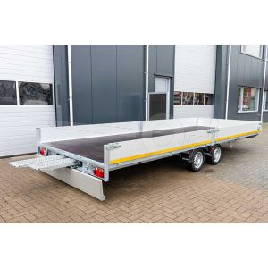 Multitransporter Eduard met lier en oprijplaten. Afmeting 606x200cm met 40cm hoge borden. Laadvloerhoogte 63cm. Bruto laadvermogen 3500kg